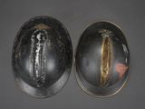 two helmets that have been left on the table