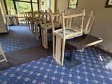 many chairs that are lined up in a room