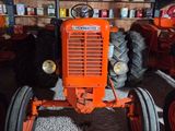 a tractor that is parked in a garage