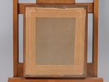 a picture of an old wooden frame with a picture on it