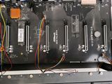 a close up of a computer board with wires on it