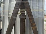 a large metal object that is on a wooden stand