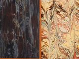 two paintings of different colors that are on the wall