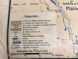 a map on the wall of a building showing the location of a plane