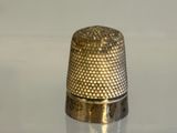 a thimble that is sitting on a table