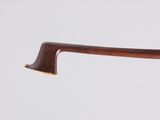a close up of a wooden handle on a wooden stick