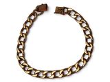 a gold chain bracelet on a white background