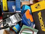 a cardboard box full of electronic devices and other items