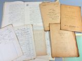 many old papers that are on a table