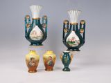 three vases that are sitting next to each other on a table