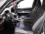the interior of a car with black leather seats and a steering wheel