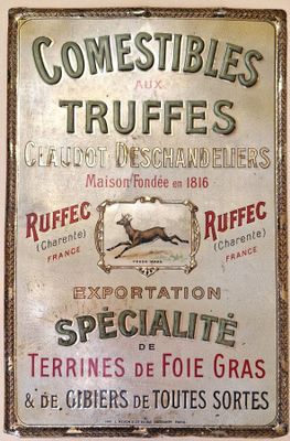 a sign on the wall that says comestibles truffles