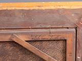 a close up of a wooden door with writing on it