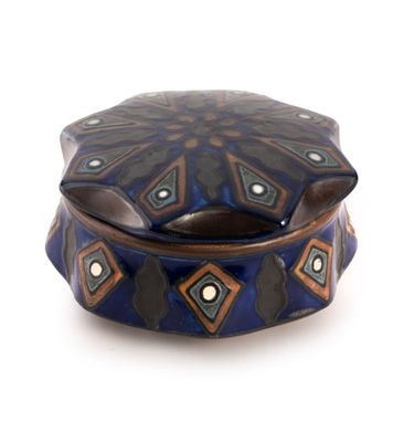 a blue and brown box sitting on a white surface