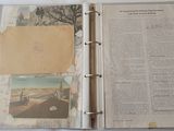 an open book with a picture of a road and a picture of a car