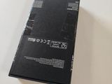 a black box that is sitting on a white table