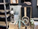 a shelf with various items on it in a room