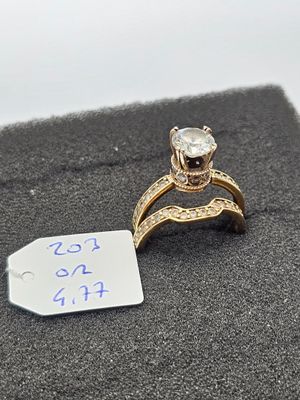 a picture of a diamond ring with a price tag on it