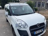 a white van that is parked in front of a house