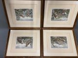 three framed pictures of birds in a snowy forest