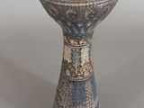 an image of a blue and white vase on a table