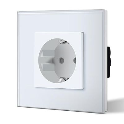 a white electrical outlet with a black button on it