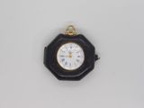 an image of a black and white clock with roman numerals on it