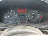 a close up of a car dashboard with a speedometer