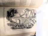 une image représentant un livre ouvert sur lequel figure l'image d'un château