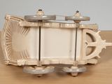 a small model of a train on a wooden table