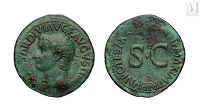 an ancient coin with the head of a man in profile and the head of a woman in profile