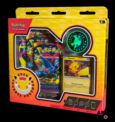 a box of pokemon cards with a glow in the background