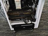 a computer case that has a bunch of wires on top of it