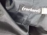a close up of a black jacket with a label on it