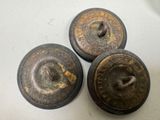 three antique cast iron knobs are sitting on a white surface