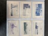 several old photographs of people are displayed on a table