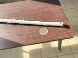 a baseball bat sitting on a table in a room
