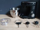 a picture of a blender and other kitchen appliances on a table
