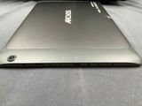 an image of a close up of a laptop computer on a bed