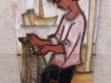 une photo d'un tableau sur le mur d'une salle de bain