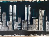 dessin représentant un paysage urbain en noir et blanc sur une feuille de papier