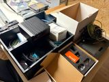 a desk with a bunch of electronics in it