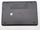 a black laptop with a blue sticker on the back of it