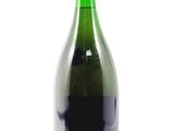 a bottle of wine that is sitting on a table