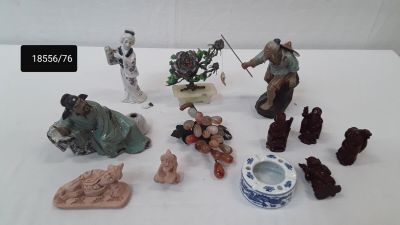 many figurines that are sitting on a table