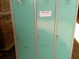 two lockers sitting on a pallet in a warehouse