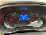 a close up of a car dashboard with a speedometer
