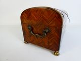 a small wooden box that has a handle on it
