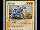 a close up of a pokemon card in a plastic case
