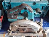 a picture of a corded circular saw on a workbench